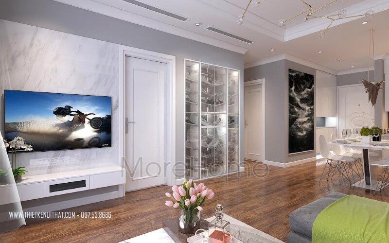 Đá ốp tường nhân tạo vân mây trắng tạo sự mới lạ và sang chảnh hơn cho khu vực phòng khách chung cư