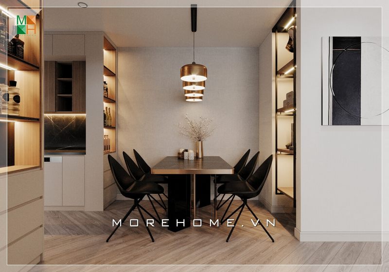 Diện tích của phòng ăn của căn hộ không lớn nhưng được thu hút bởi bàn ăn mặt đá phản chiếu ánh sáng từ hệ thống đèn chiếu sáng từ trần.